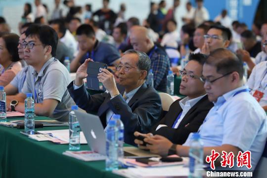研討會現(xiàn)場圖?！■暮陚?攝
